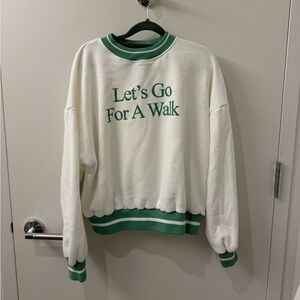 White “let’s go for a walk” sweatshirt